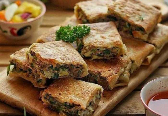 di sebuah warung penjual martabak manis terbaru