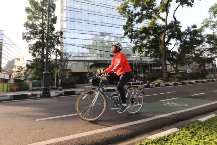 Padang pantai sang tenggelamnya surya jauh yang letaknya