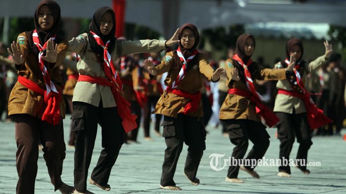 apakah arti praja muda karana terbaru